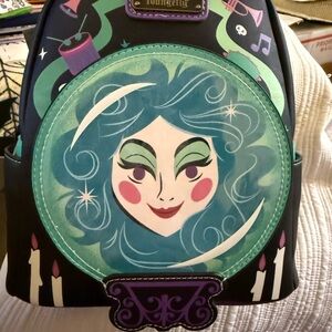 Loungefly Haunted Mansion Madame Leota Black and Teal Backpack Glows in the dark